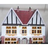 A scratch built doll's house. 36'' wide x 31'' high