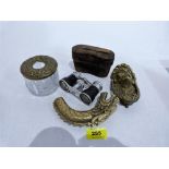 A brass door knocker, a brass dragon walking cane handle, a brass topped glass jar and a pair of