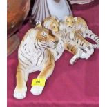 A resinous group of tigers figure