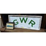 A GWR wooden sign 40'' wide together with six framed prints of locomotives