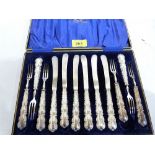 A cased silver handles set of cake knives and forks for six