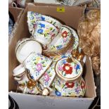 A box of Baron China tea and dinnerware