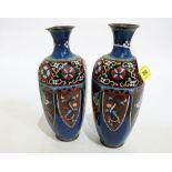 A pair of Japanese cloisonné enamel hexagonal vases, typically decorated with birds, dragons and