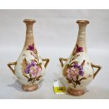 A pair of Royal Bonn two handled vases, gilded and painted in colours with flowers and birds. 9''