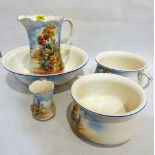 A Falcon Ware washstand jug and bowl set of five pieces. Jug handle repaired