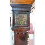 An 18th century oak longcase clock with 30 hour movement and 10'' brass engraved dial signed N.