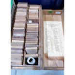 A boxed collection of 60 wood specimens from around the world. Bears label for Fitchett and