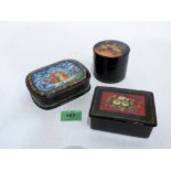 Three Russian lacquer boxes decorated with figures or flowers, the larger 5¼'' wide