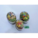 Three decorated card Easter eggs