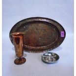 An Arts and Crafts oval copper tray, a copper vase and a Borrowdale beaten steel small bowl