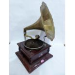 A gramophone with brass horn