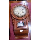 A mahogany drop dial wall clock with two train movement.23'' high