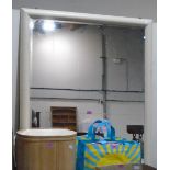 A wall mirror with painted frame and bevelled plate. 52'' high