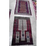 Two small red ground eastern rugs, 56'' x 35'' and 46'' x 28''