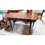 A George IV mahogany side table on ring turned legs. 45'' wide