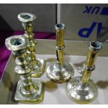 Two pairs of 19th century brass candlesticks