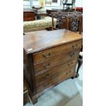 A George III style mahogany chest of four long graduated drawers on bracket feet. 32'' wide