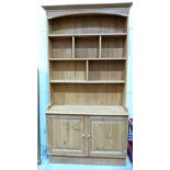 A pine dresser with raised rack. 46'' wide