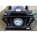 A French mantle clock in architectural black slate case. 11¾'' high