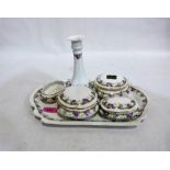 A six piece ceramic dressing table set. C.1900. One cover lacking