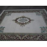 A cream ground oriental carpet. 144'' x 108''