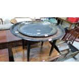 A 19th century toleware tray on table base and an oval papier-mache tray10-20