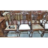 A set of six George III style mahogany dining chairs on cabriole ball and claw legs. Seat cushions