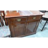 A late Victorian mahogany cabinet, the top with writing slide. 40'' wide