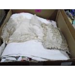 A box of lace and other textiles, the lot to include a Victorian pinwork cushion