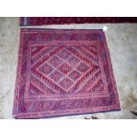 A tribal Gazak rug 123cm x 116cm