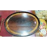 A George III inlaid mahogany oval tray. 27'' wide. A.F