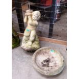 A garden statuary fountain in the form of a putto. 25'' high