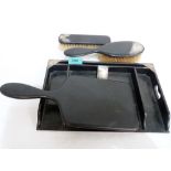 A four piece ebony and silver mounted dressing table set