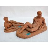 Two terracotta statues of reclining man and lady, he 15'' wide