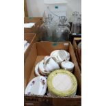 A box of teaware, nine demi-john jars and a fermenting bucket