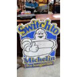 A hardboard Michelin 'Switch to Michelin for longer life' advertising sign. 41½'' x 30½''