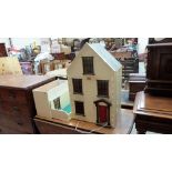 A doll's house with a quantity of furniture. 18'' wide