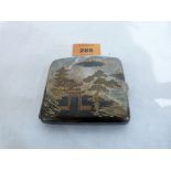A silver cigarette case with niello decoration of Japanese landscapes to exterior and interior.