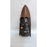 Tribal Art: An African carved hardwood tribal mask. 26'' high