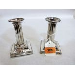 A pair of Victorian silver Corinthian candlesticks by Eyre & Co. Sheffield 1889. Loaded. 5'' high.