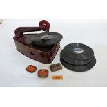 A German Bing Works Bingola III tinplate gramophone, the lot to include five records and three