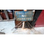 A Police Notice No Parking enamel sign on folding iron stand, the sign 10'' x 15''