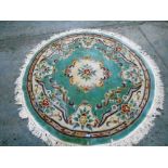 Three Chinese circular rugs