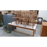 A beechwood table, 72'' long and a set of six lath back chairs