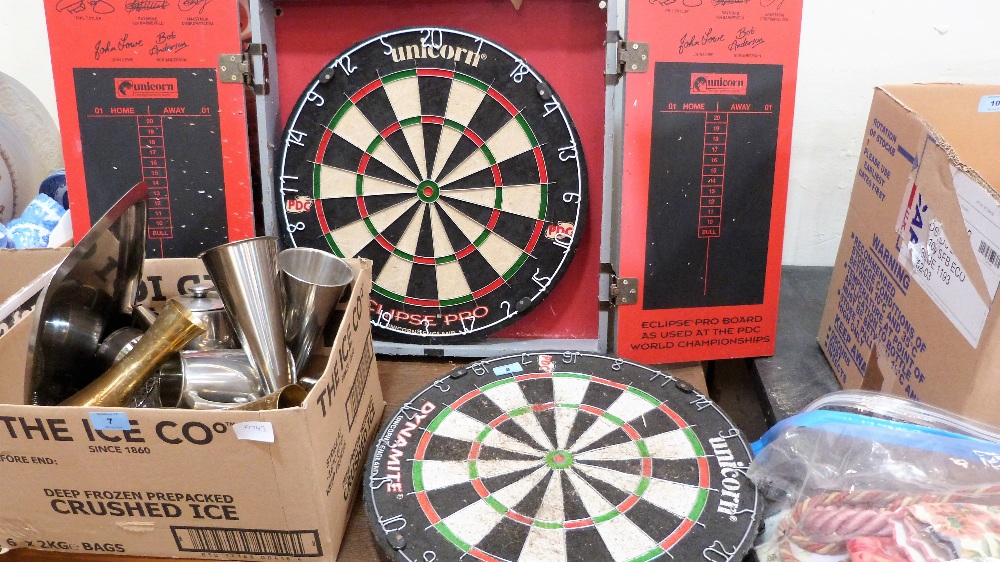 A Lakeside professional dartboard in wall cabinet, the lot to include three sets of darts and