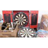 A Lakeside professional dartboard in wall cabinet, the lot to include three sets of darts and