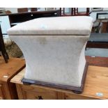 A Victorian sarcophagus form ottoman on compressed bun feet. 20'' wide