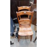 A pair of Victorian kitchen chairs on ring turned legs