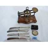 Six silver hafted cake knives, letter scales, a silver cased keyless watch (A.F) and a papier-