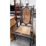 A James II oak and caned elbow chair